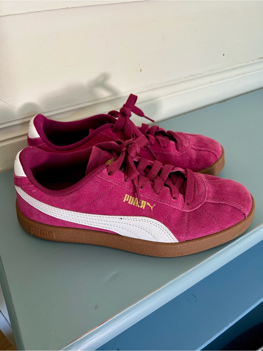 Puma Women's Suede Sneaker in Magenta with White Stripe